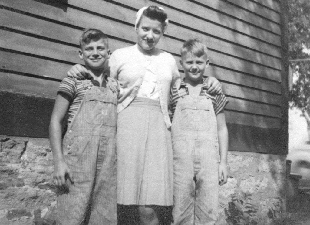 Evelyn Budd Michaels with her younger brothers